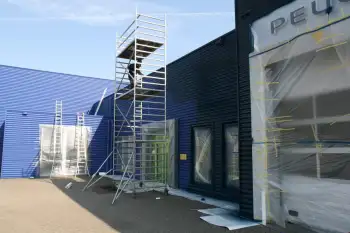 Nieuwe gevelcoating voor bedrijfspand met behulp van airless coating
