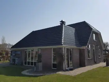 Gevelcoating van woonhuis in Wapenveld